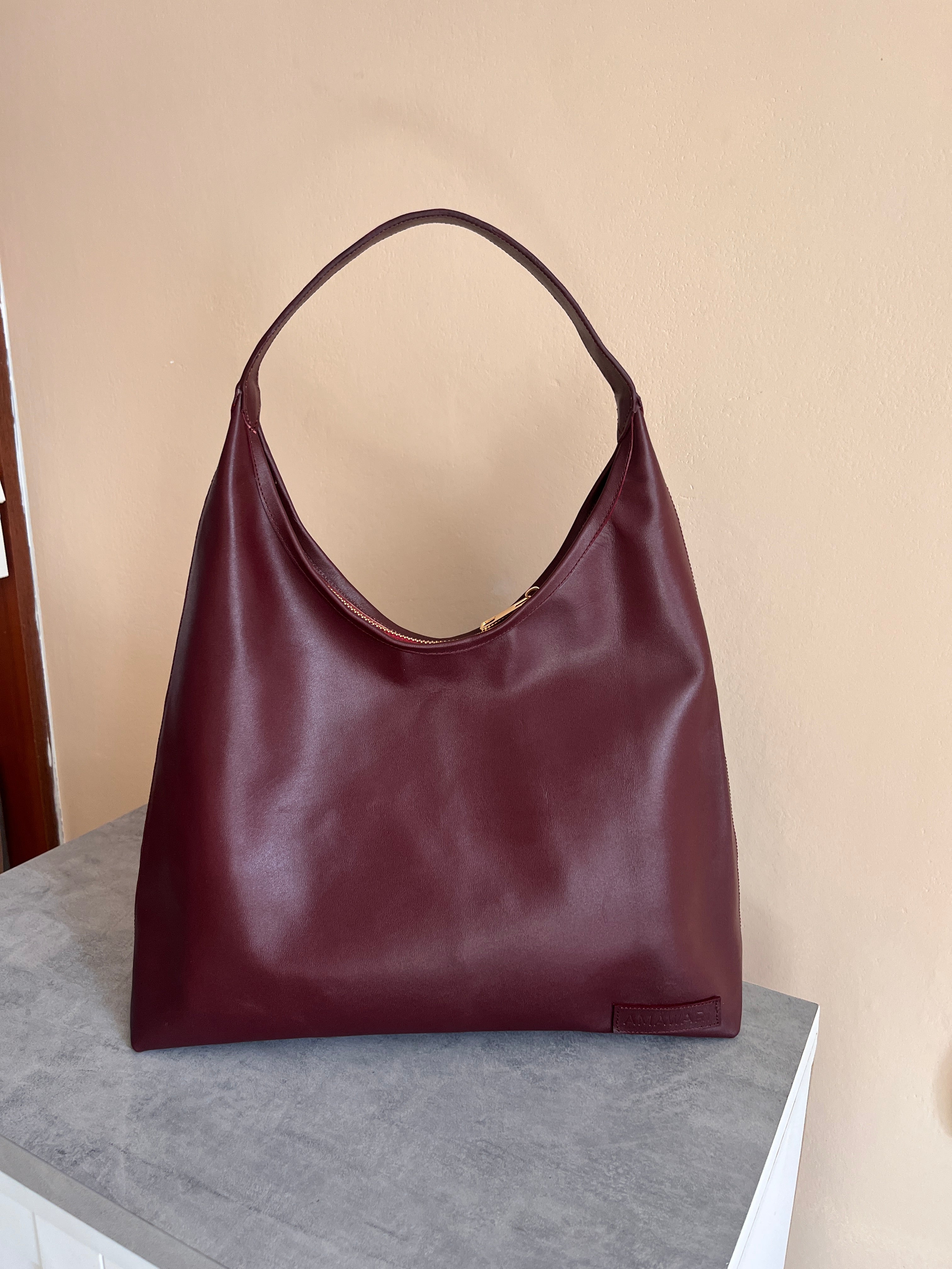CARTERA RAFAELA 100% CUERO VINO